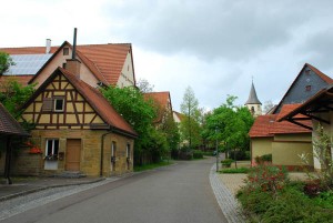 Village bake house at left and a view to the church of St. Nikolaus