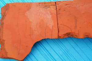 The name 'Seviri' is easily seen once the tile has been moistened